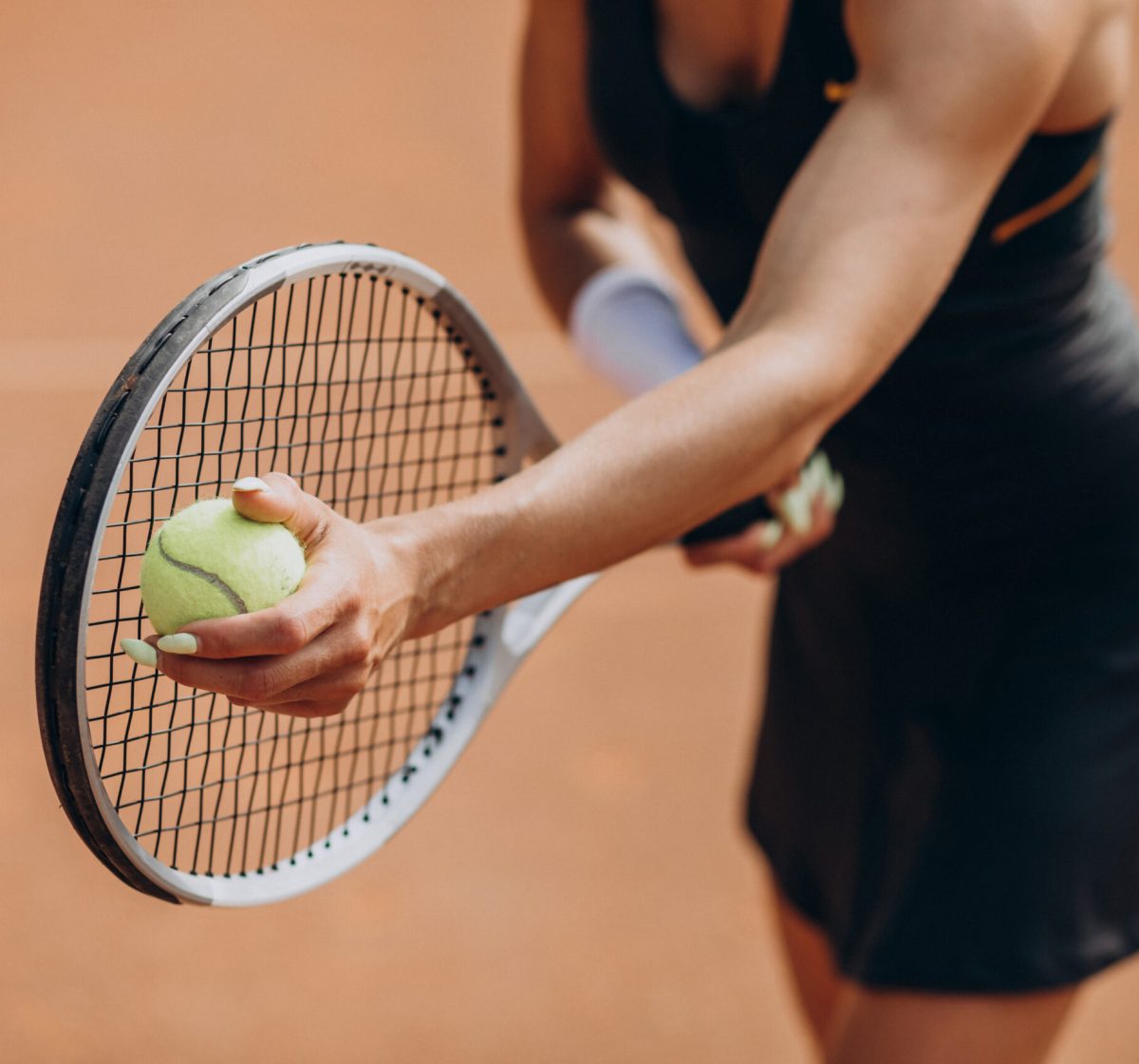 Female tennis player at the tennis court